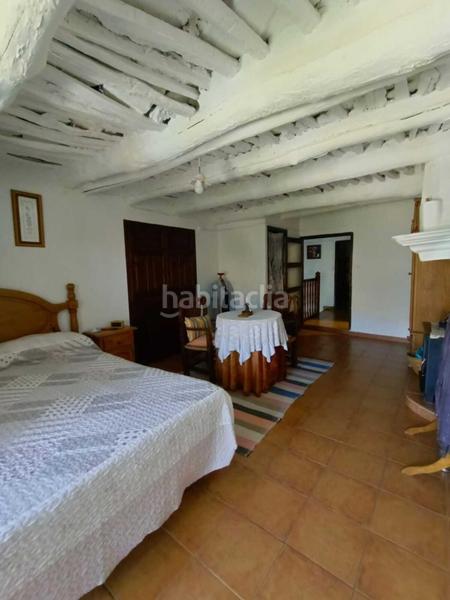 Foto 58fd88a9-3d12-47f8-b149-8c581b21f6d2. Casa  de 180 m en el casco histórico encanto, vigas de castaño y paz absoluta en Capileira