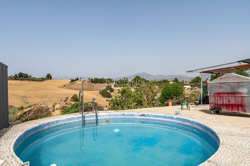 Foto 8ae9bdec-d96d-45da-8c6b-e8b96fc3d48c. Casa amb aparcament piscina a Casalpalma - Fahala Cártama