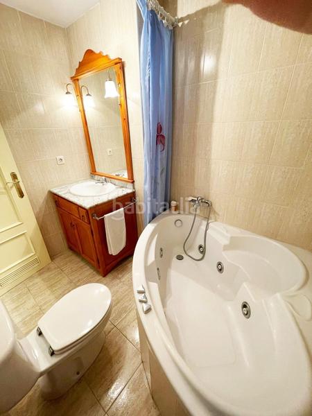 Foto cf60f138-a2d7-42f3-a107-9832d5c4bd81. Apartamento amplio piso con terraza, garaje y ubicación excepcional cerca del centro y la playa en Nerja