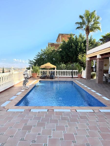 Foto 665e39b2-0350-4d98-8b59-4e0cd6ead57e. Xalet a calle minerva a Coín