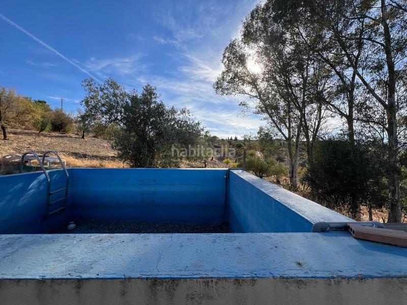 Foto a91e1c04-7a25-435c-bb10-55b220f4bd68. Casa con piscina in Coín