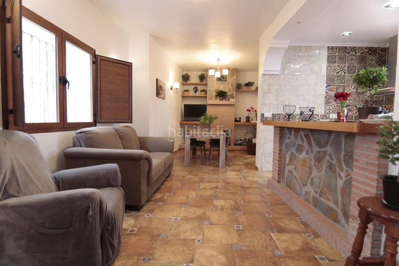 Foto e256ce0a-374d-4bc7-929e-2d4f2d288f83. Casa adossada a Guaro