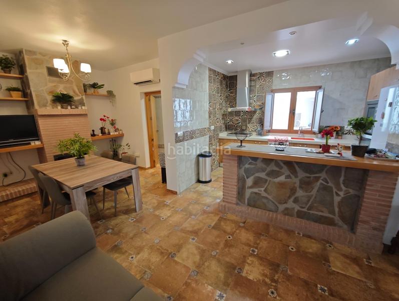 Foto f8e025df-e260-4ebd-a79a-ddddab3051db. Casa adossada a Guaro