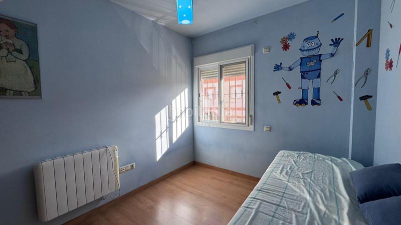 Foto 24bd1c5c-777c-4a88-9718-c9de6c5d922a. Casa adossada amb aparcament a Colmenar