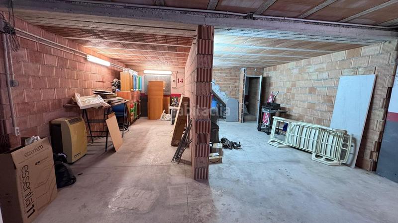 Foto 2c2ce889-eabb-418e-b9c2-abc1f63c1f86. Casa adossada amb aparcament a Colmenar