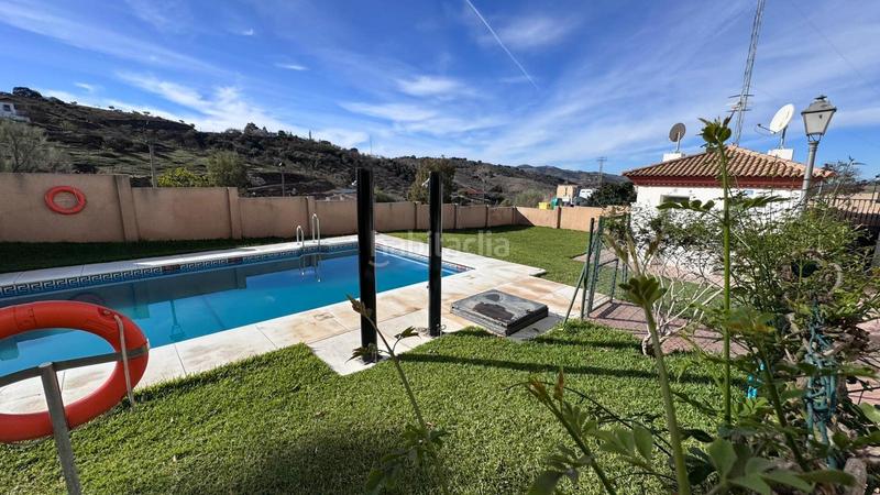 Foto 4fd651f6-5525-44d9-a86c-e79374e2dd4b. Casa adossada amb aparcament a Colmenar