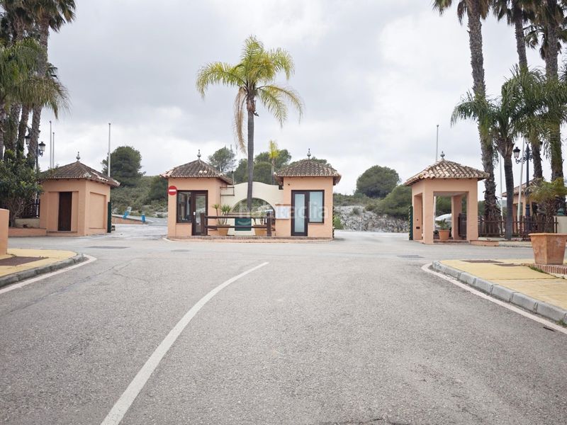 Foto 0fe9703e-01cb-4be9-b3a1-889e6bb29607. Casa aparellada amb aparcament piscina a Coín