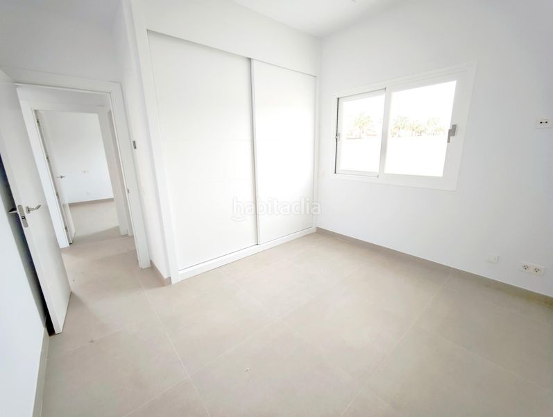 Foto 3de36896-58cb-42c3-9714-85e5b344cbf2. Casa aparellada amb aparcament piscina a Coín