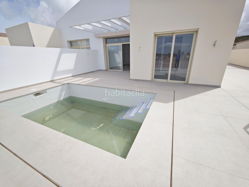 Foto 4457a535-d7ad-40f0-82bc-8c7d49dd5955. Casa aparellada amb aparcament piscina a Coín