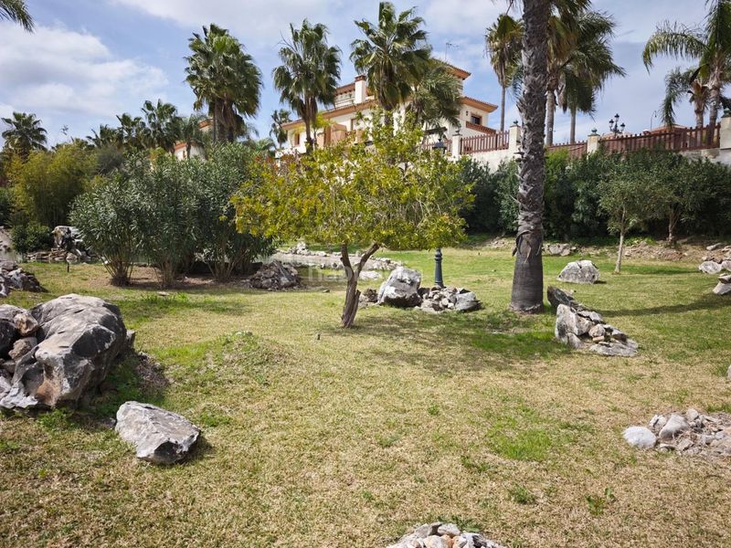 Foto c38d6fac-34a8-40f5-9ca8-a6c987a25510. Casa aparellada amb aparcament piscina a Coín