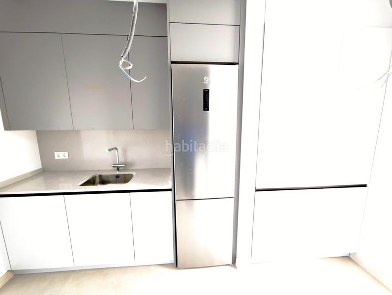 Foto d5016f1b-f386-4e4e-a12a-3c38430919ef. Casa aparellada amb aparcament piscina a Coín