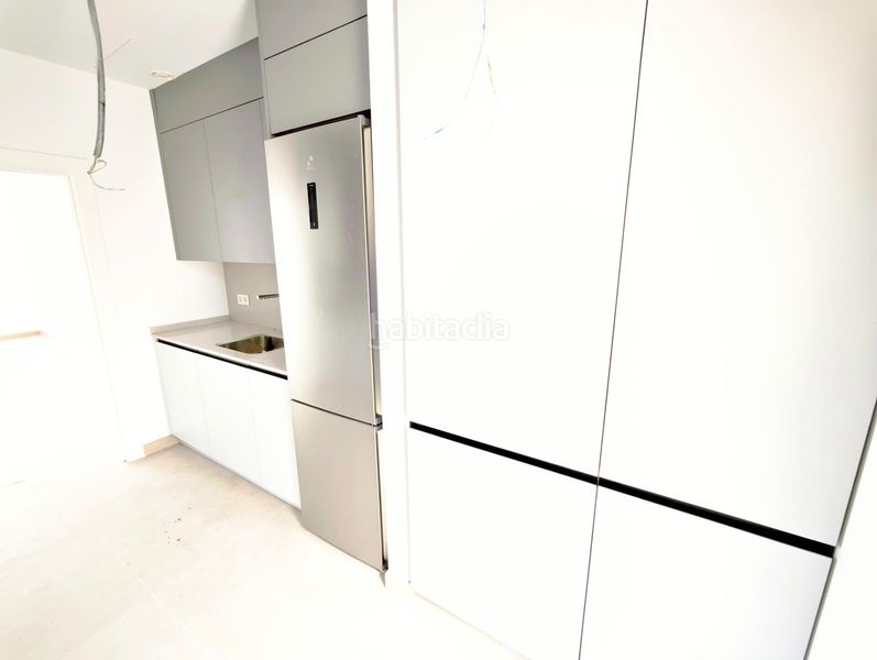 Foto dd0a5231-dd94-49fc-aac7-9d5ad0be12b1. Casa aparellada amb aparcament piscina a Coín