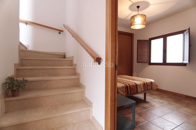 Foto 473282a7-a9ae-4885-af7a-0e0f5a45c009. Casa adossada a Guaro