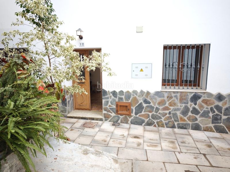 Foto b011ab14-765c-438d-b072-50fac1fb6579. Casa adossada a Guaro