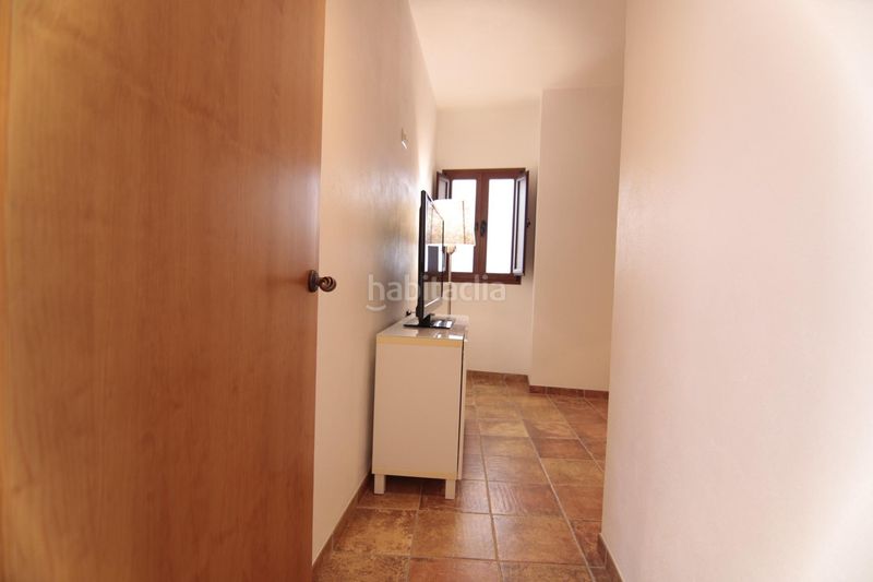 Foto bb7a273d-ea2a-48fa-9d4a-3d821ef91ab9. Casa adossada a Guaro