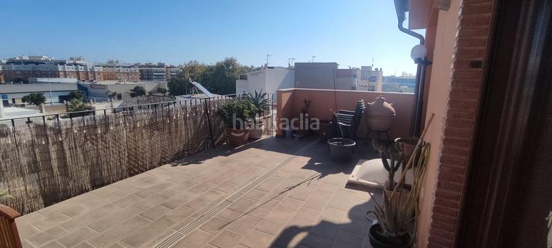 Foto ca82f906-032c-43fa-9f6e-9fc63edc2365. Casa a schiera con riscaldamento parcheggio in Avenida de Abril-9 de Octubre Sagunt
