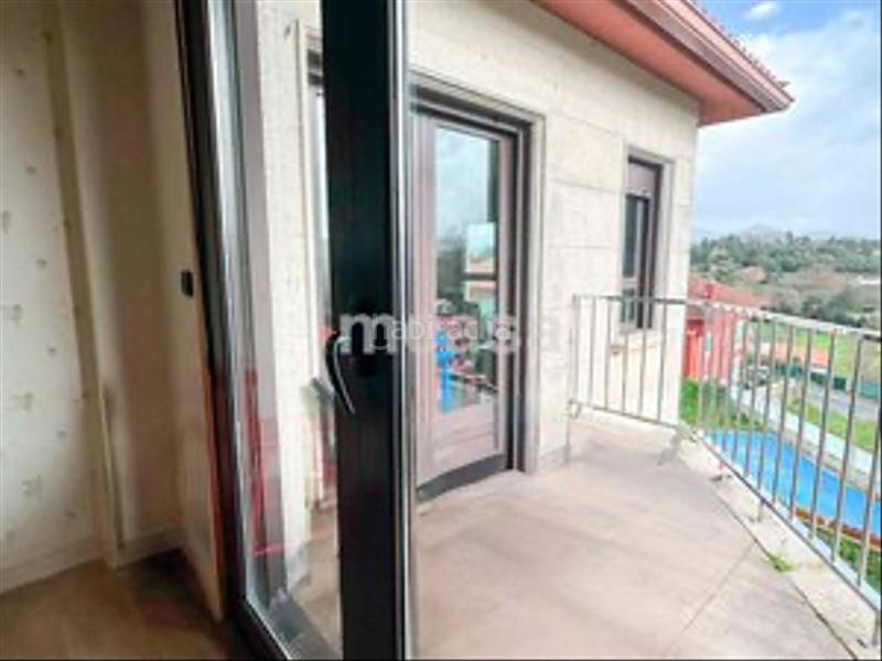 Foto 6a98ebb5-61f6-4bb4-b970-eb721f5260c2. Casa a schiera con parcheggio piscina in San Pedro da Ramallosa Nigrán