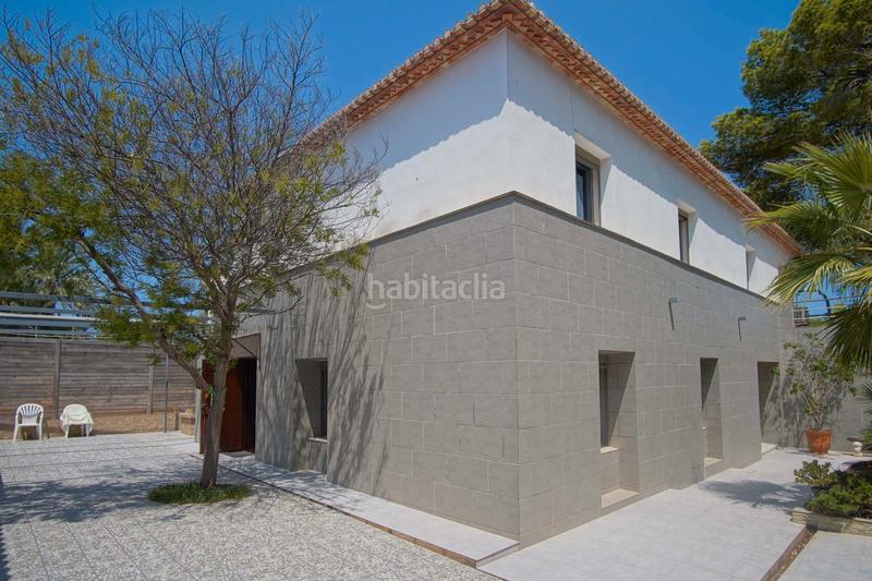 Foto 8905f60d-1c11-4a1d-807f-c3c1fa18824c. Chalet mit parking pool in Las Rotas / Les Rotes Dénia