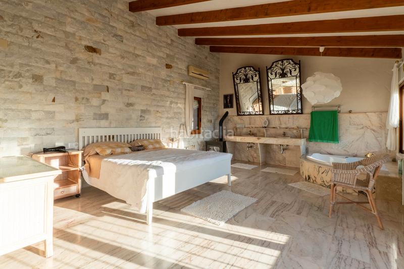 Foto 9488bbee-b55e-4ca1-abda-86693e4cc882. Chalet avec parking piscine dans La Viña-Montemar-San Jaime Benissa