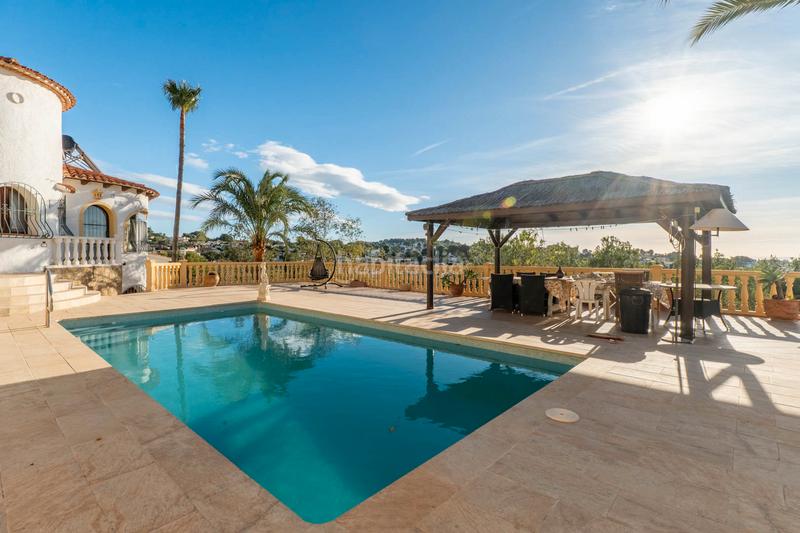 Foto c64cccdd-f9a5-499d-a1b1-d2ceefba59ab. Chalet avec parking piscine dans La Viña-Montemar-San Jaime Benissa