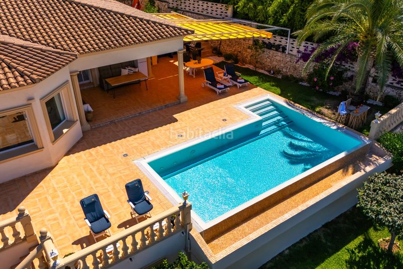 Foto c2a1b848-7446-41f3-9cf3-cf2e294f60c8. Xalet amb calefacció aparcament piscina a El Montgó Dénia