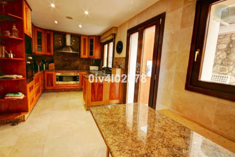Foto 7e5ae0f8-73c0-4982-8c02-972d5047191d. Casa adossada amb aparcament a Centro Benalmádena
