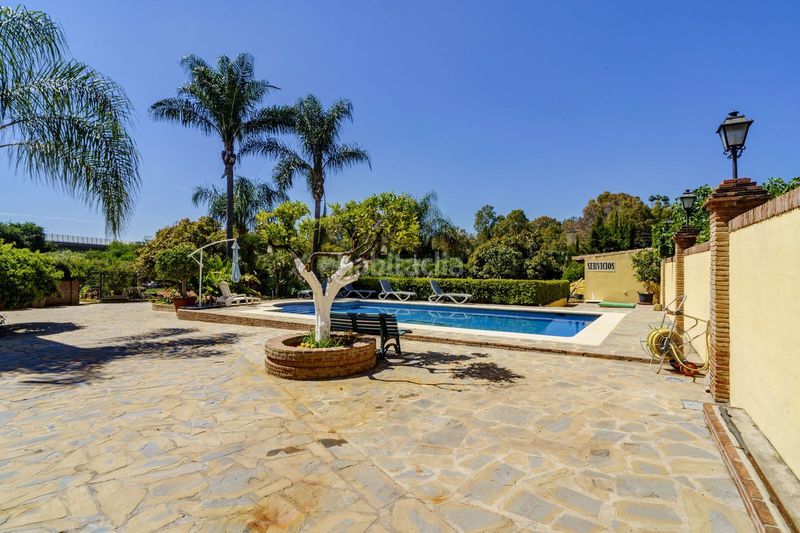 Foto cbe10d7c-1038-4f4d-9c75-fdb38447a05e. Casa adossada amb aparcament a La Quinta Benahavís