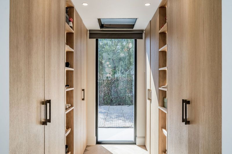 Foto c2c41a04-2ac5-4c1b-bf29-647c2bb4d4f2. Casa adossada amb aparcament a Las Brisas Marbella