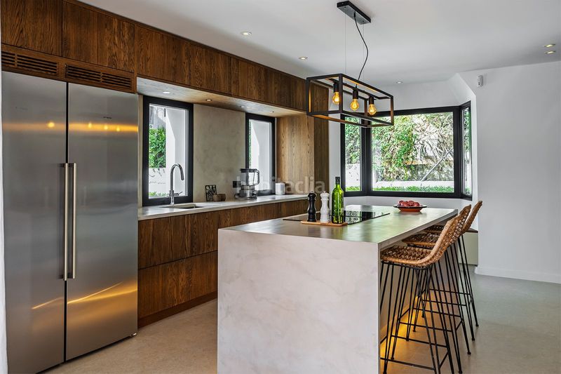 Foto f30dff0e-8ab3-4d89-9b5a-71608ab16f7d. Casa adossada amb aparcament a Las Brisas Marbella