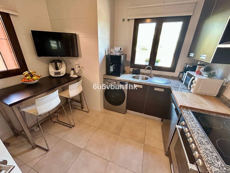 Foto 153dcd71-ce3b-4ce7-bf63-6e70912ba872. Casa adossada a Centro Benalmádena