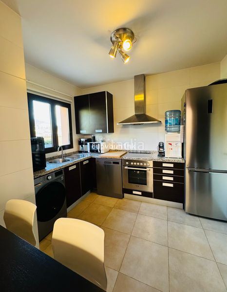 Foto b0fcf209-86e5-433a-80ea-5460e960408e. Casa adossada a Centro Benalmádena