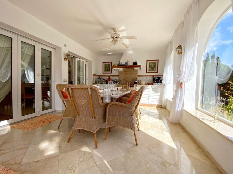 Foto c5a3e80f-c4f4-4dec-af7f-31bbd3913168. Casa adossada amb aparcament a Sierra Blanca Marbella