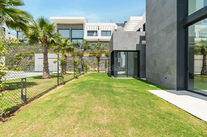 Foto 406a213e-1cd2-4670-9354-4f19ffeb7a9a. Casa adossada a Río Real Marbella