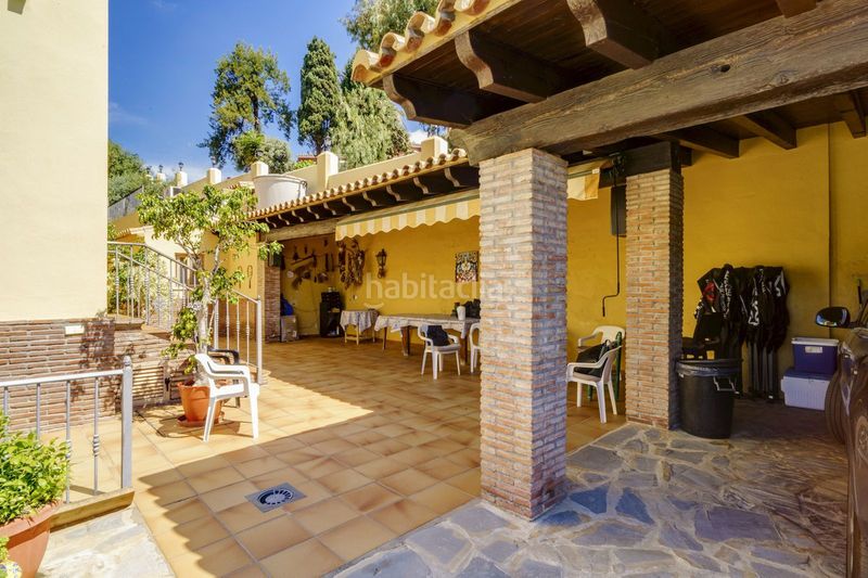 Foto 78633689-fd89-47a5-a6d4-e030e7cca786. Reihenhaus mit parking in La Quinta Benahavís