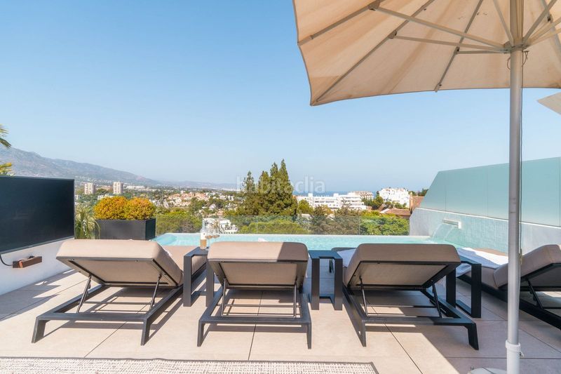 Foto c0aa5ad1-e35f-44e0-9364-efb8cfadc68d. Casa adosada en Las Brisas Marbella