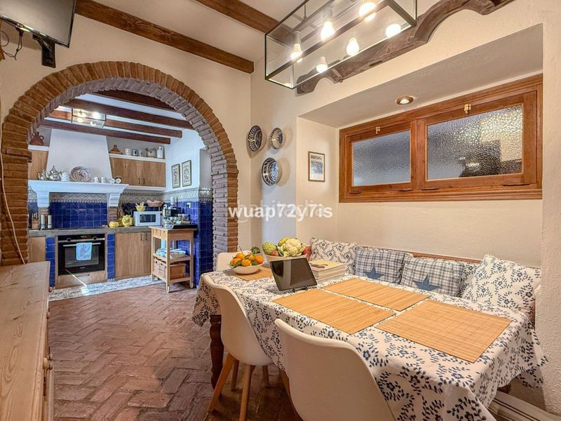 Foto 212f5f68-bda0-4062-b8bf-8cd65625adb4. Casa adossada a Sierra Blanca Marbella