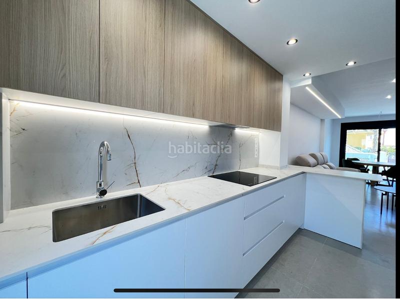 Foto 793a8d13-9907-490f-863f-dfc554213e94. Maison jumelée avec parking piscine dans Benferri