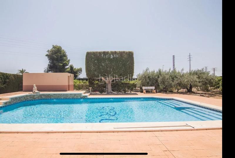 Foto 3e7799a1-3445-4b9b-9d19-17c71ac442c0. Chalet  de lujo con nave de 400 m y piscina , barbacoa etc en Elche / Elx