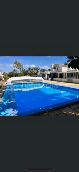 Foto c0f161b7-63a5-4d9c-8f3e-f392de014bb2. Xalet amb xemeneia aparcament piscina a El Palmeral - San Antón Elche / Elx