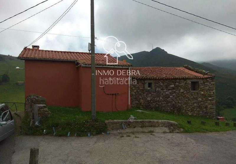 Foto cf70c191-5c72-4cac-afb3-0fee8203e583. Casa cabaña . en Cudillero