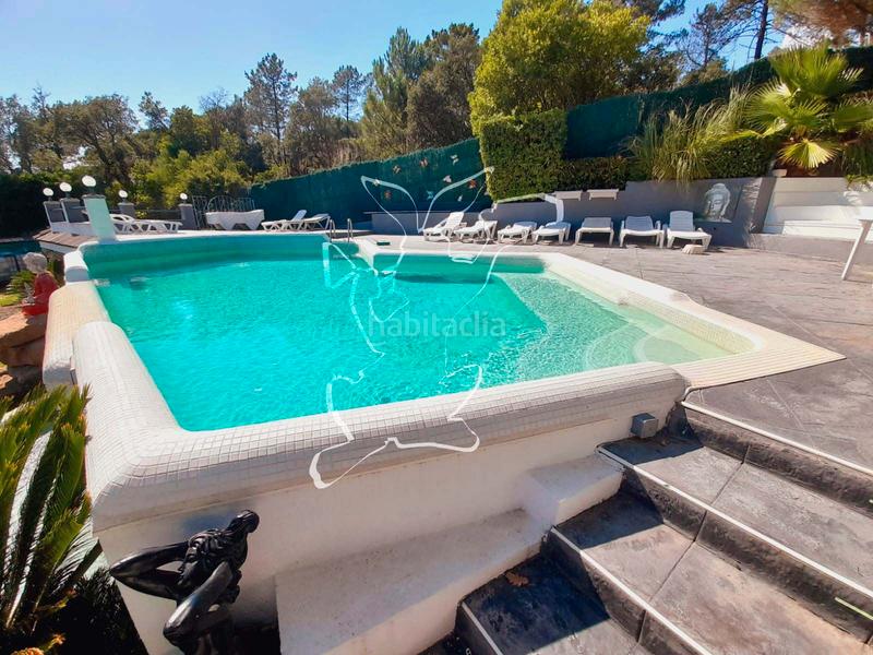 Foto 23cc1494-15cd-4a78-96b9-1d5c67e5a416. Chalet avec cheminée parking piscine dans Aiguaviva Parc Vidreres
