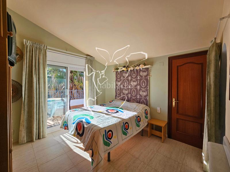 Foto 4995fd2a-3624-45c5-a4fa-2ce716fdcb7c. Chalet avec cheminée parking piscine dans Aiguaviva Parc Vidreres