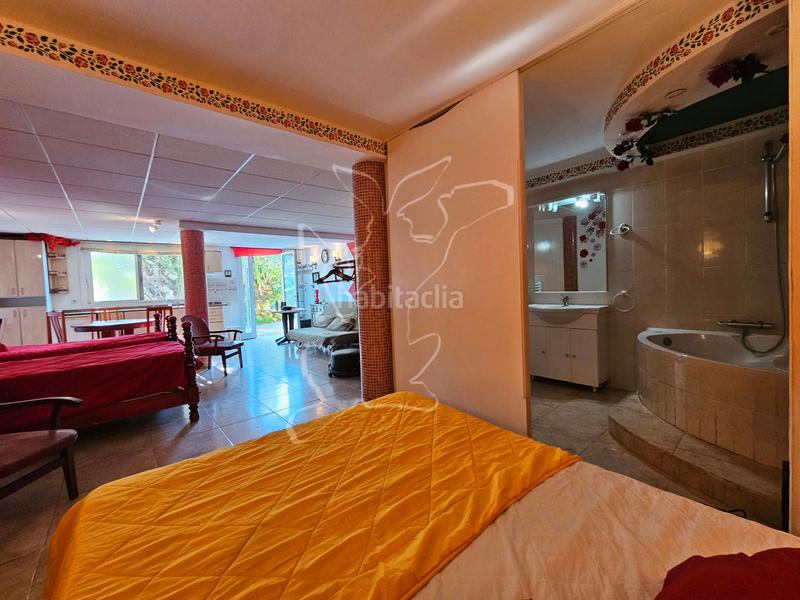 Foto cbd8f6f9-3735-472e-bb7d-2204a20328ef. Chalet avec cheminée parking piscine dans Aiguaviva Parc Vidreres