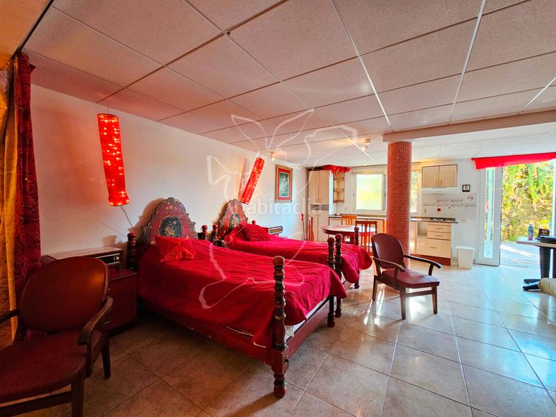 Foto ea41efe1-e312-4fc7-af29-3d61123a29e5. Chalet avec cheminée parking piscine dans Aiguaviva Parc Vidreres