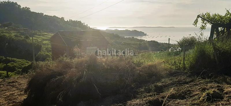 Foto b0077429-a0ba-41d6-a5d3-9c11d2c99f8a. Residential plot in Bueu