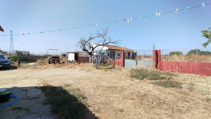 Foto df583503-c03f-4c50-88a3-16ff077b016b. Finca rústica a San Juan del Puerto