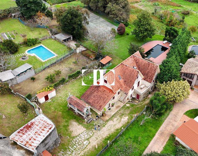 Foto f3027d8b-7ff2-4bb7-b20d-6d75e85fa1c5. Chalet mit heizung pool in Moaña