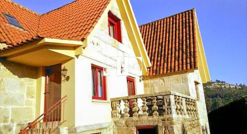 Foto 0b6fc6e0-ac6c-44d5-a48d-89fc62dcf4fb. Xalet amb calefacció piscina a Moaña