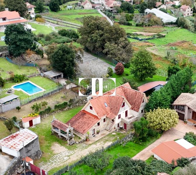 Foto 126b7f90-8e93-430a-a0f6-197f9deb1a39. Xalet amb calefacció piscina a Moaña