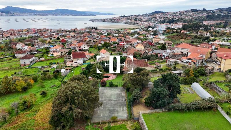 Foto 2123d150-0055-4076-a27d-366ae55d902c. Xalet amb calefacció piscina a Moaña